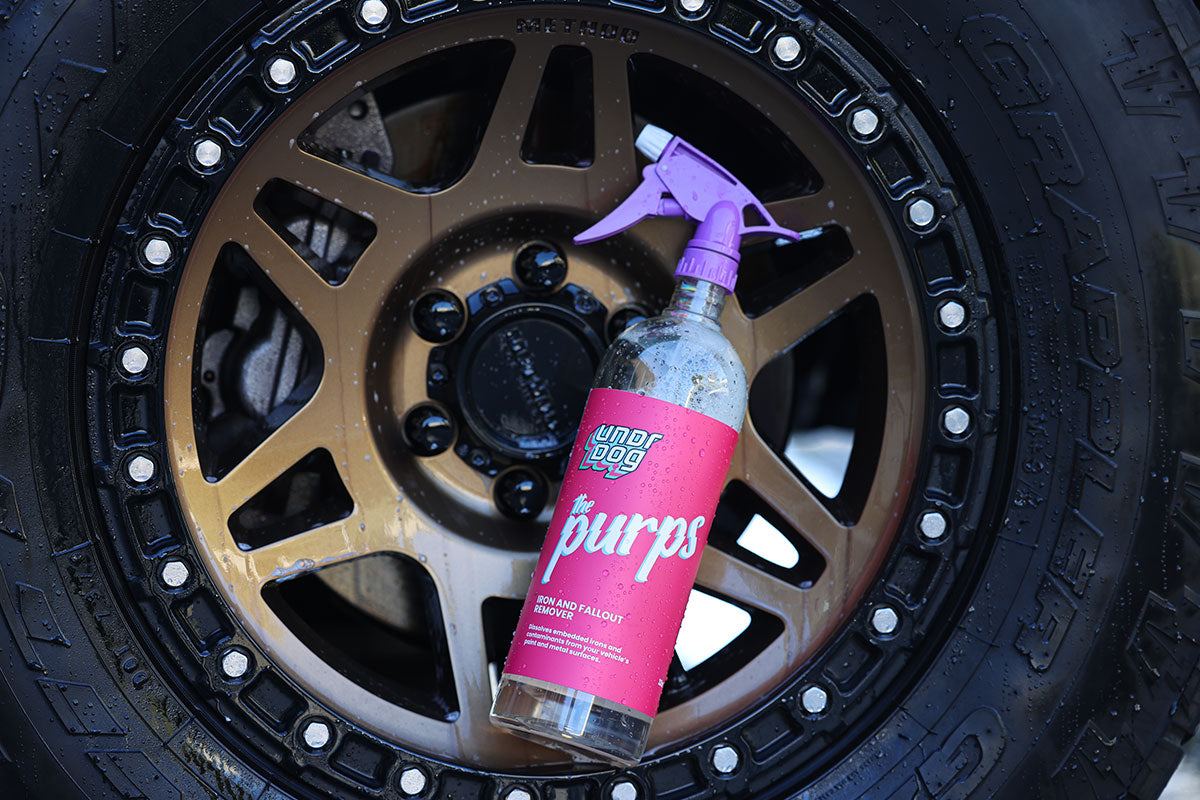 Undrdog Purps iron remover on a bronze alloy wheel before decontamination