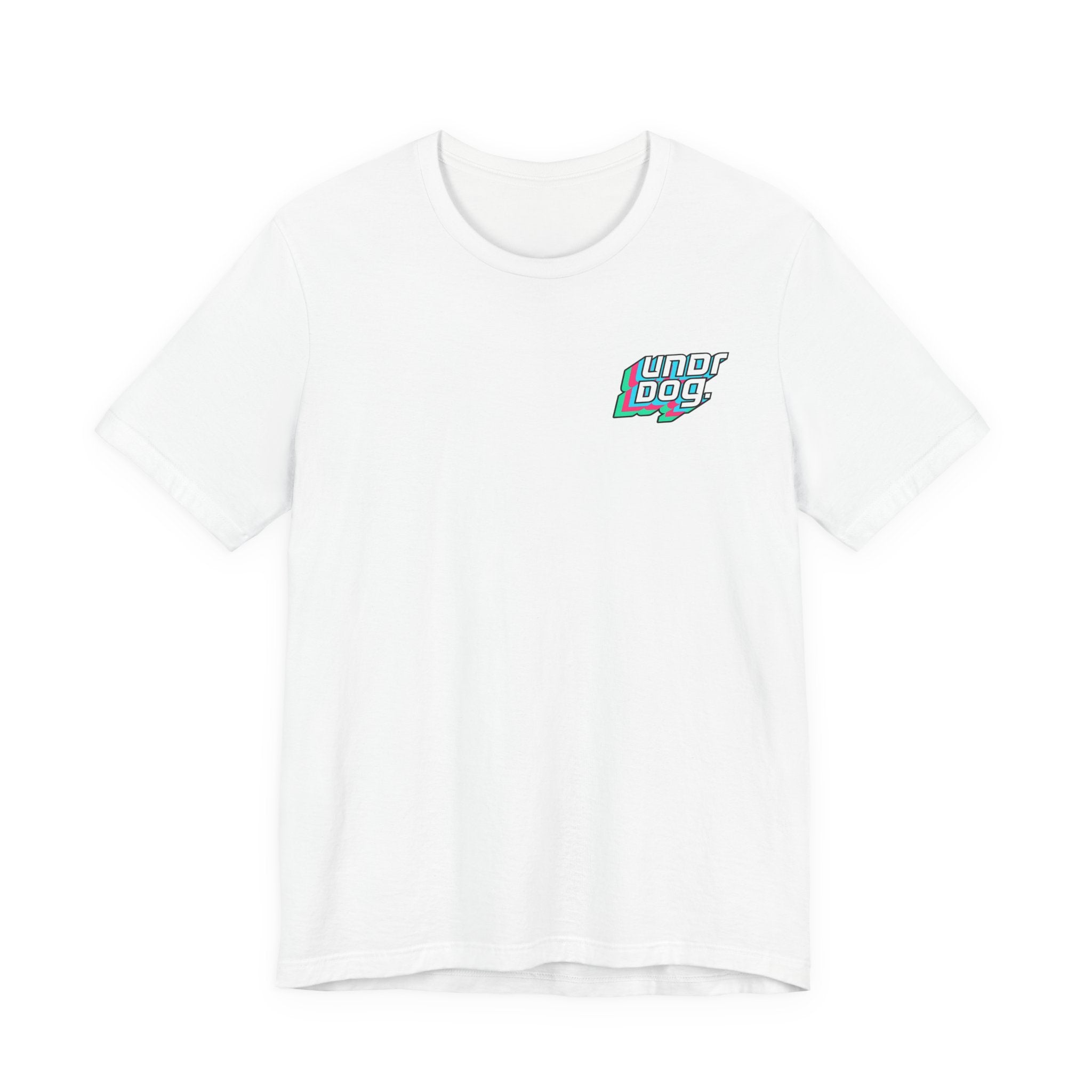A Unisex Jersey Short Sleeve Tee by Printify in plain white, featuring a small, colorful "UND DOG" logo on the left chest. Made from soft Airlume combed cotton, the shirt is displayed laid flat against a white background.