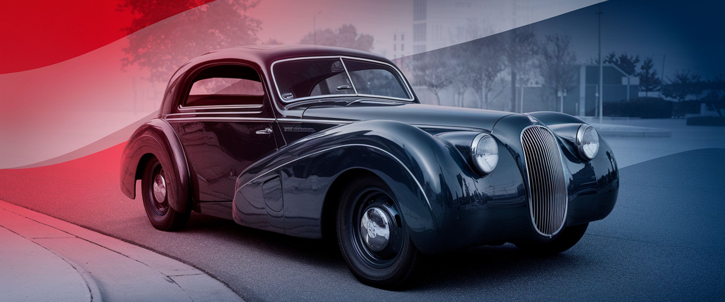 A vintage black car with a sleek, rounded body is parked on a street. The background features a blend of red, white, and blue tones, adding a stylized effect to the image. Trees and buildings are faintly visible in the background.