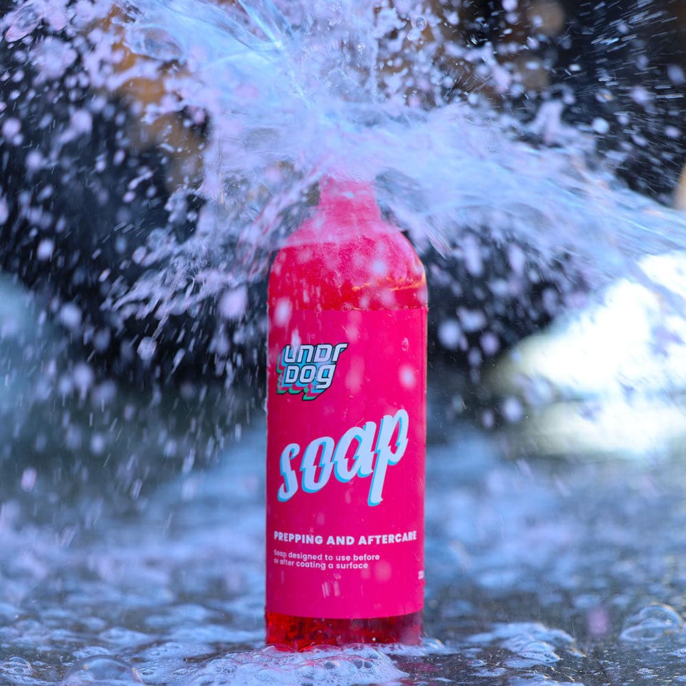 Undrdog Soap bottle photographed with water