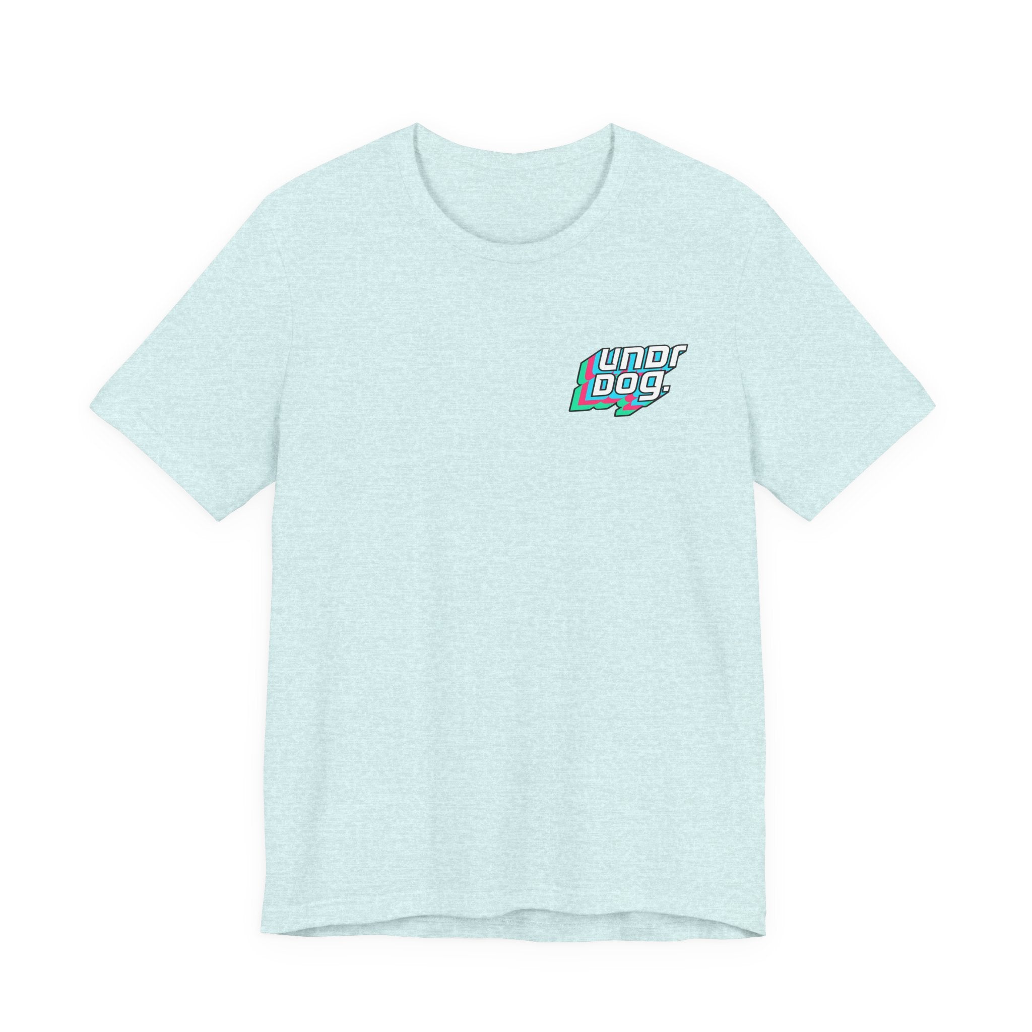 The See Yourself In It Retro Sportscar Tee by Printify features a light blue synthwave style and a small, colorful "UNDERDOG" graphic on the left chest, shown laid flat against a white background.
