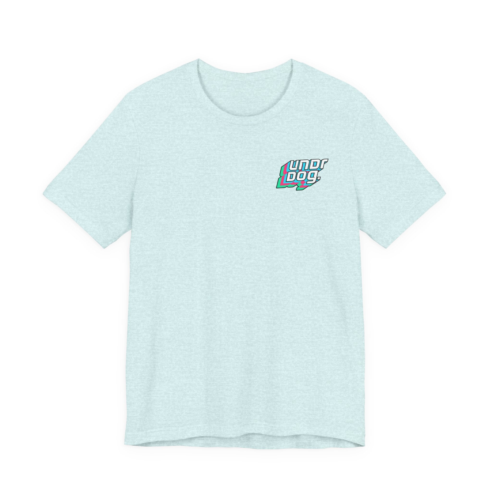 A light blue Unisex Jersey Short Sleeve Tee by Printify, made from premium Airlume combed cotton, showcases a small, colorful "Underdog" graphic on the left chest. This classic crewneck shirt features short sleeves and is displayed against a plain white background.